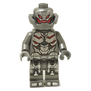A LEGO minifigure representing the character Ultron from the Marvel Universe, with a silver body and red eyes, featuring detailed circuitry and armor plating.