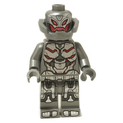A LEGO minifigure representing the character Ultron from the Marvel Universe, with a silver body and red eyes, featuring detailed circuitry and armor plating.