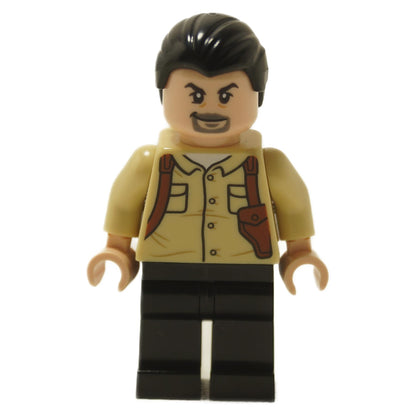 LEGO Jurassic World Vic Hoskins minifigure shown from the front. He wears a tan shirt with a printed gun holster and has a confident, smirking expression.