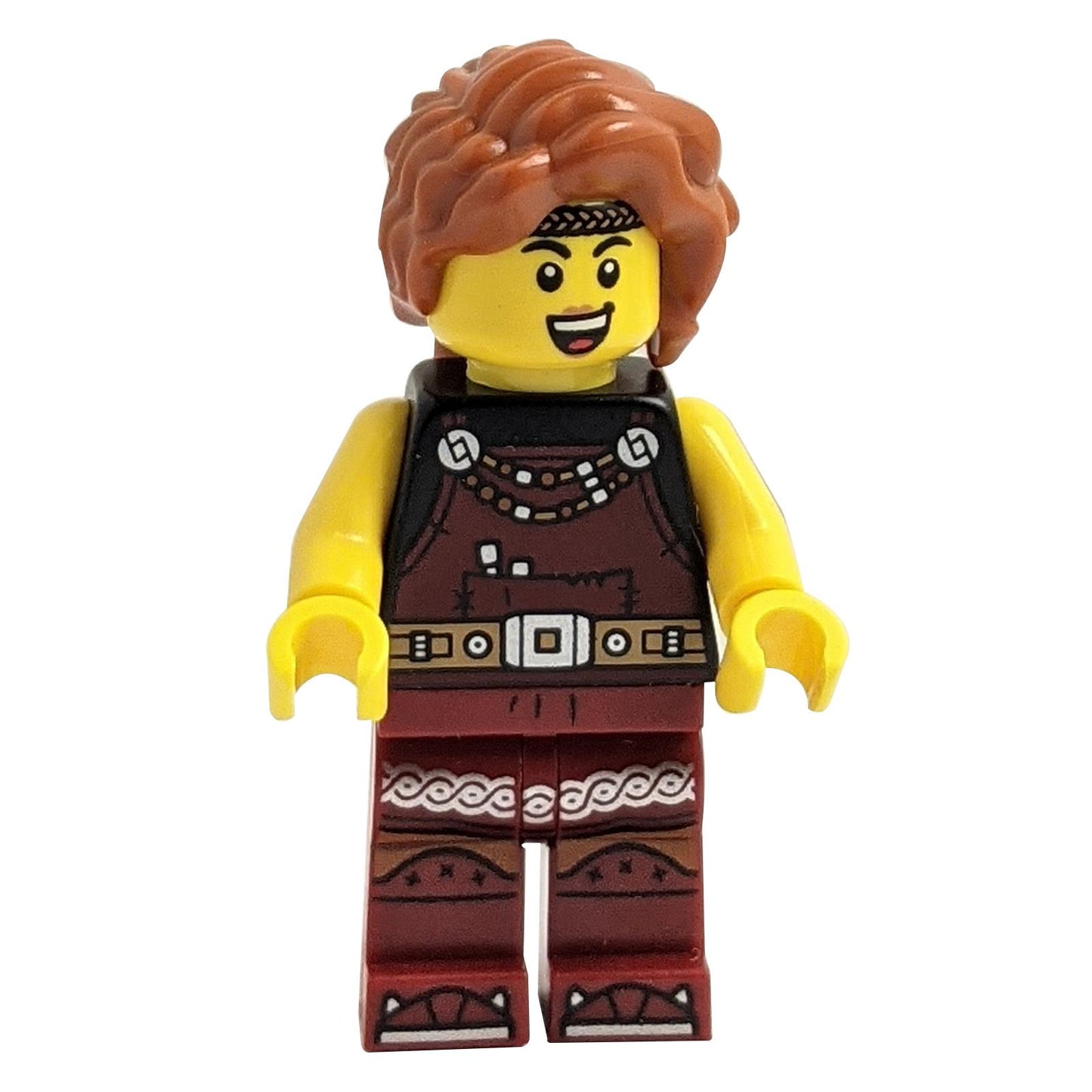 LEGO minifigure of a Viking Blacksmith female character with dark red overalls and dark red legs with trim, and dark orange hair.