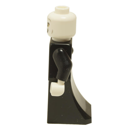 Side view of Lord Voldemort minifigure with white head, snake-like facial features, and black skirt piece