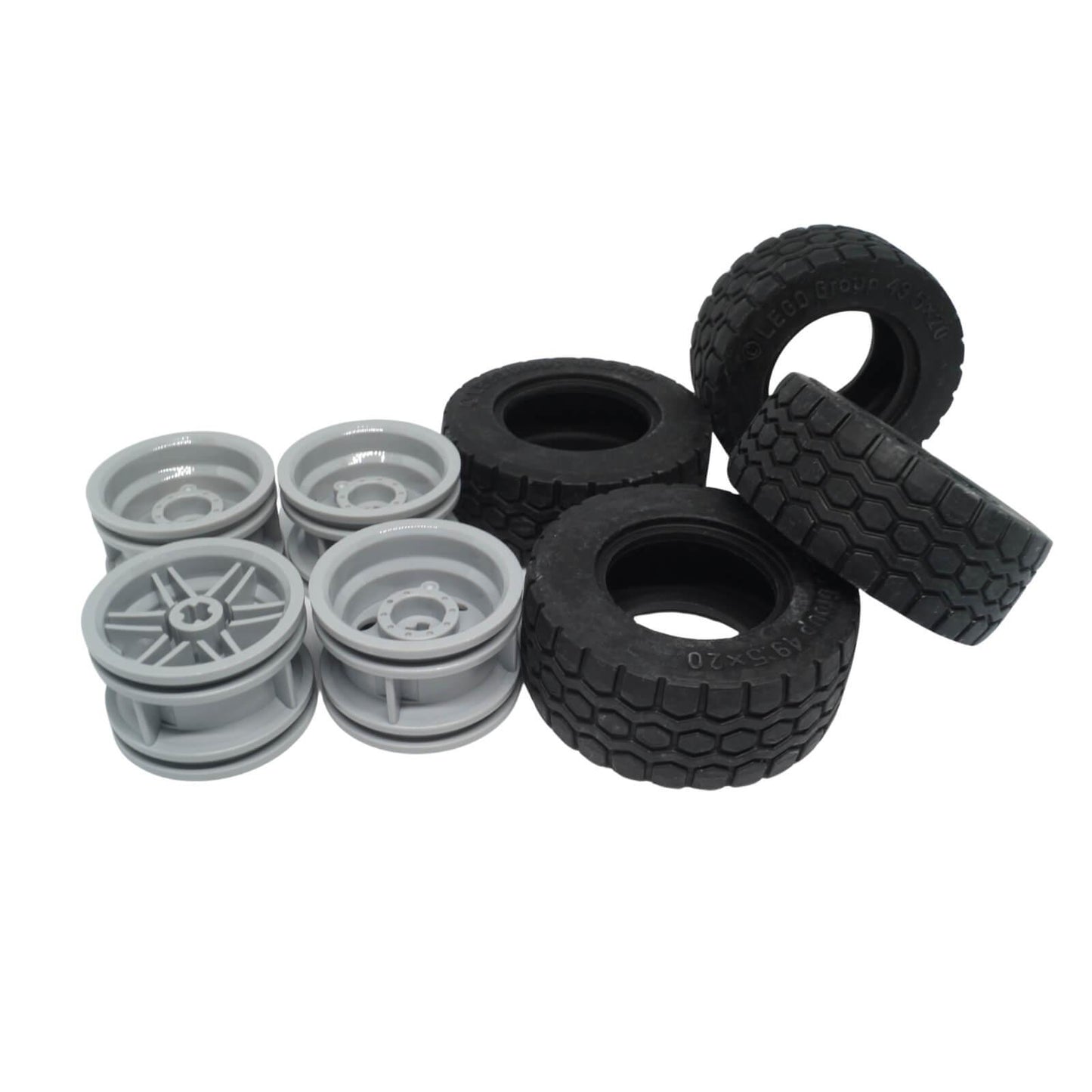 Four LEGO wheel and tyre assemblies with light bluish grey reinforced rims and black 43.2 x 22 ZR tyres part 56145c01