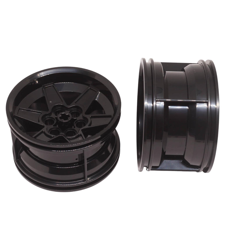 LEGO Technic 56mm x 34mm racing wheel with 6 pin holes for large-scale vehicle builds (Part 15038) in black
