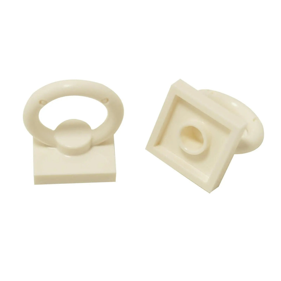 White modified 2x2 tile with ring handle on top, shown front and underside.
