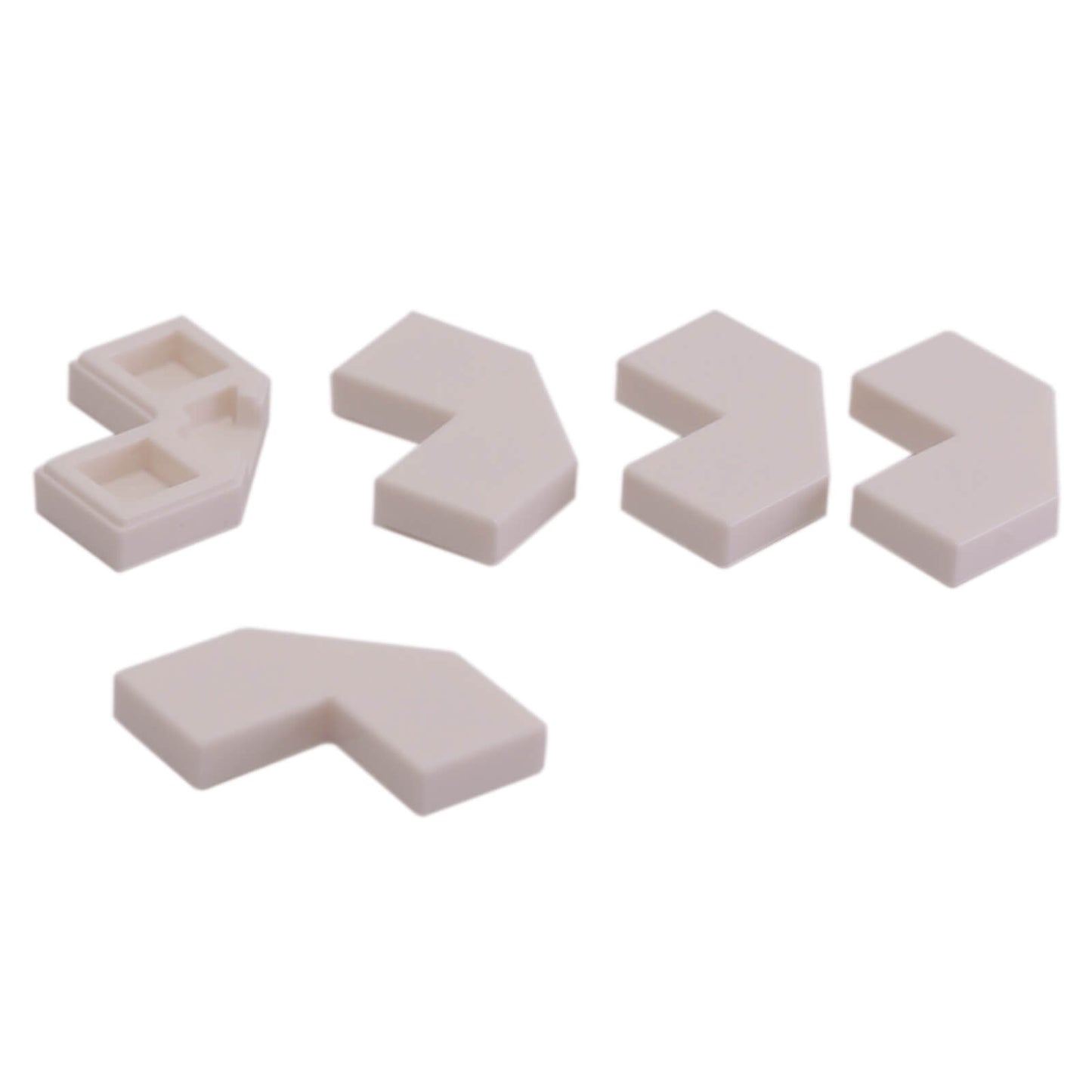 White modified facet Tile 2 x 2 for angled detailing, decorative surfaces, and clean LEGO® builds
