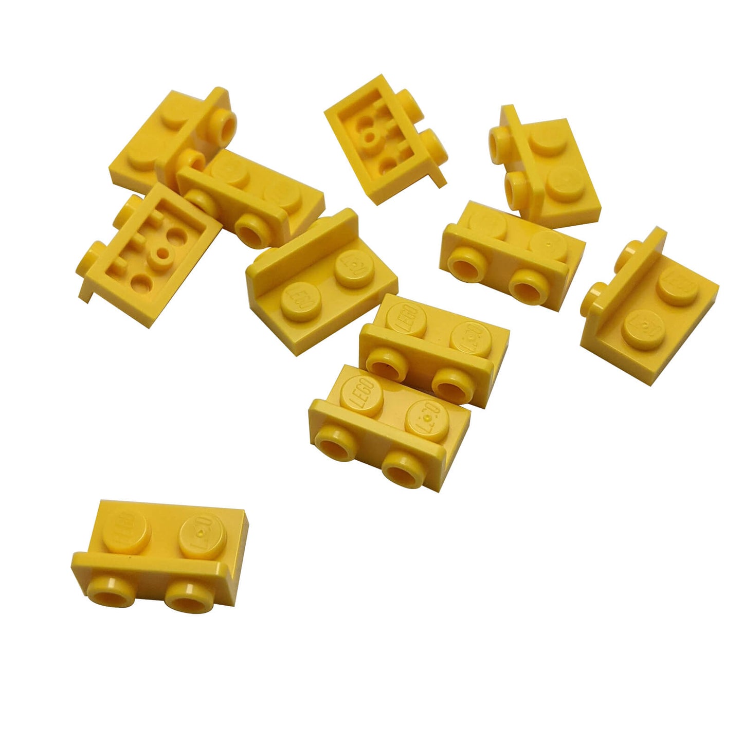 Yellow inverted bracket 1 x 2 - 1 x 2 part 99780, offset building element for compact SNOT construction
