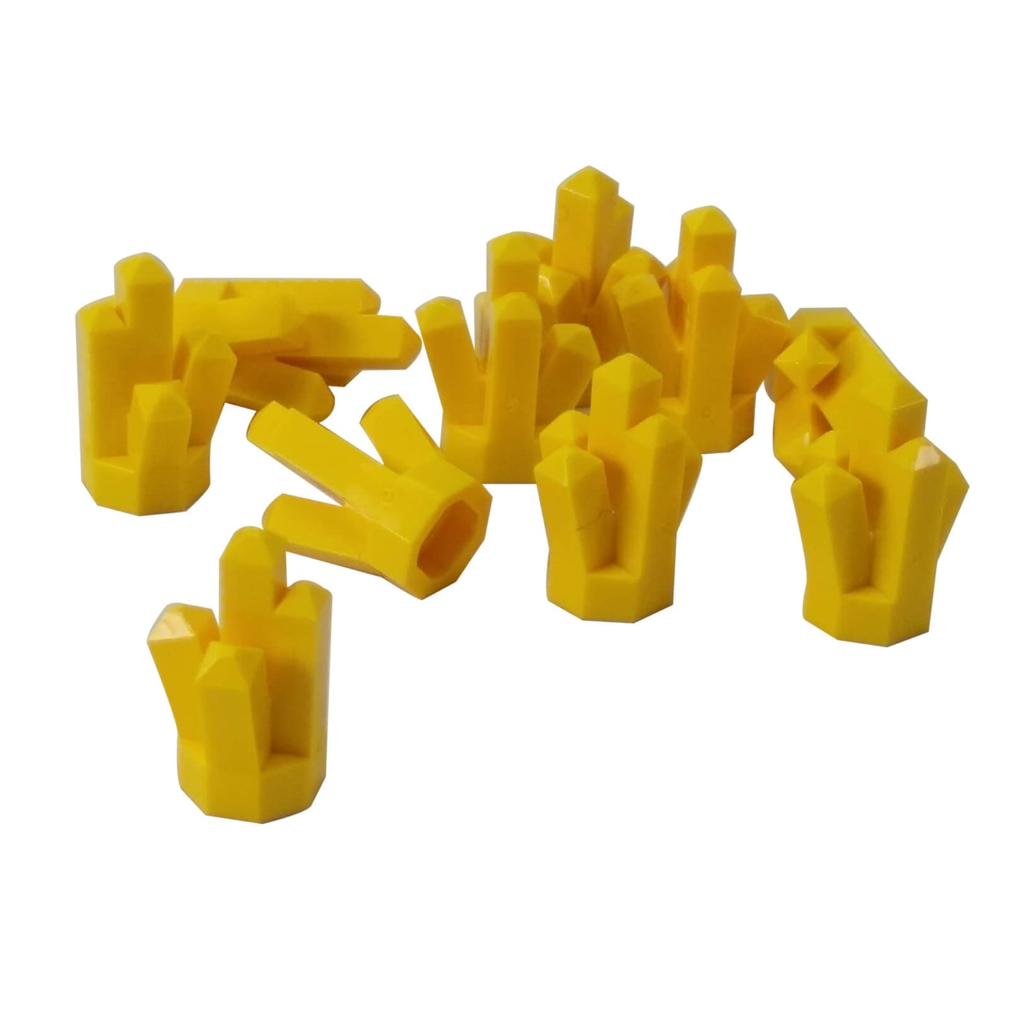 Multiple LEGO® yellow Rock 1 × 1 Crystal 5 Point elements shown from various angles