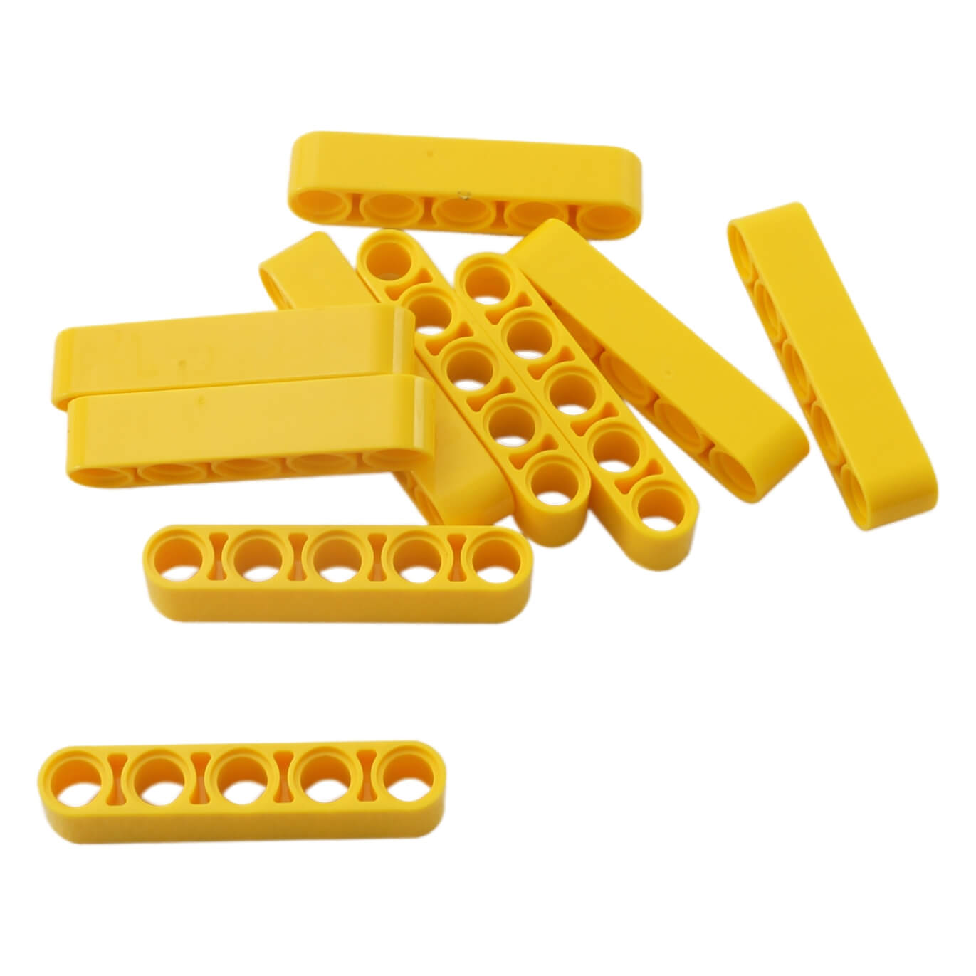 Grupo de piezas de LEGO Technic 1x3 Thick Liftarm (32316) en color amarillo apiladas.