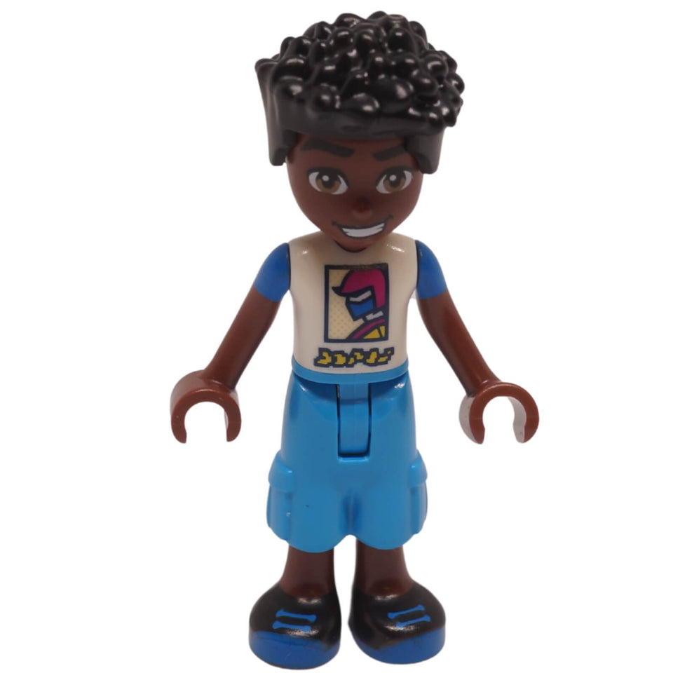 Zac mini doll with dark curly hair, racer graphic shirt, blue shorts and black shoes

